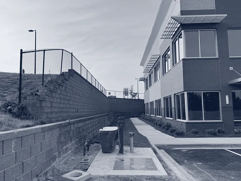 Creekside Medical Office Building 400 — Retaining wall and utility corridor, April 2024
